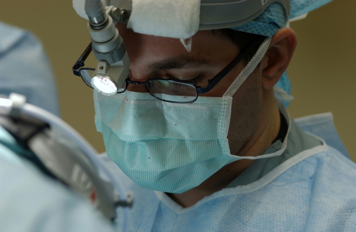 Doctor Wearing Mask With Head Torch