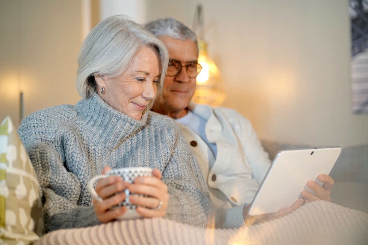 Elderly Couple Viewing Tablet